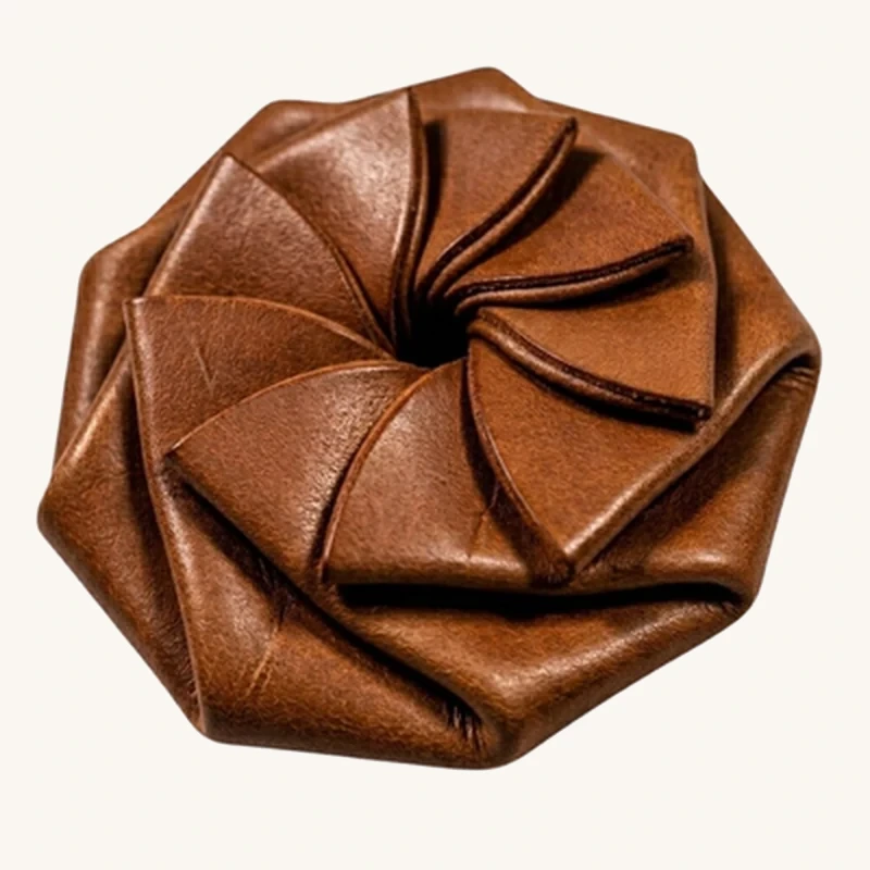 Origami Pinwheel Purse folded from vegetable-tanned leather
