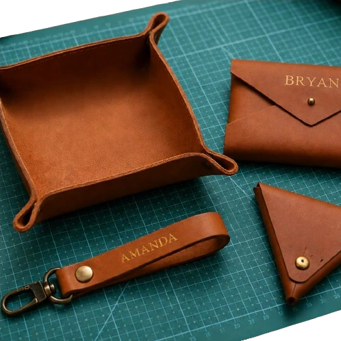 4 leather pieces spread out over a mat